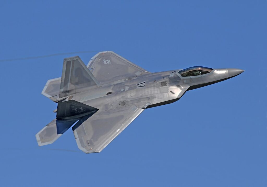 A U.S. military aircraft flies over the Gulf of Aden as a radar screen displays an unidentified track.