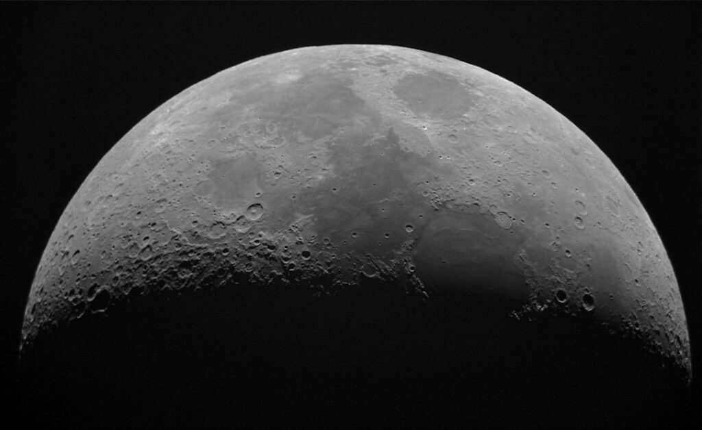 Grainy black-and-white lunar photograph with five circled areas labeled Area 1 through Area 5 above the horizon.