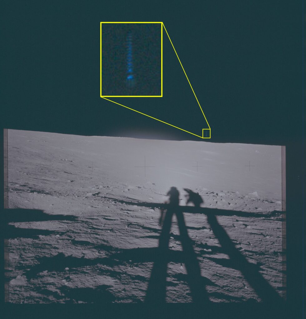 Archival NASA Apollo 12 photograph of the lunar surface with a highlighted area where unidentified phenomena are visible above the horizon.